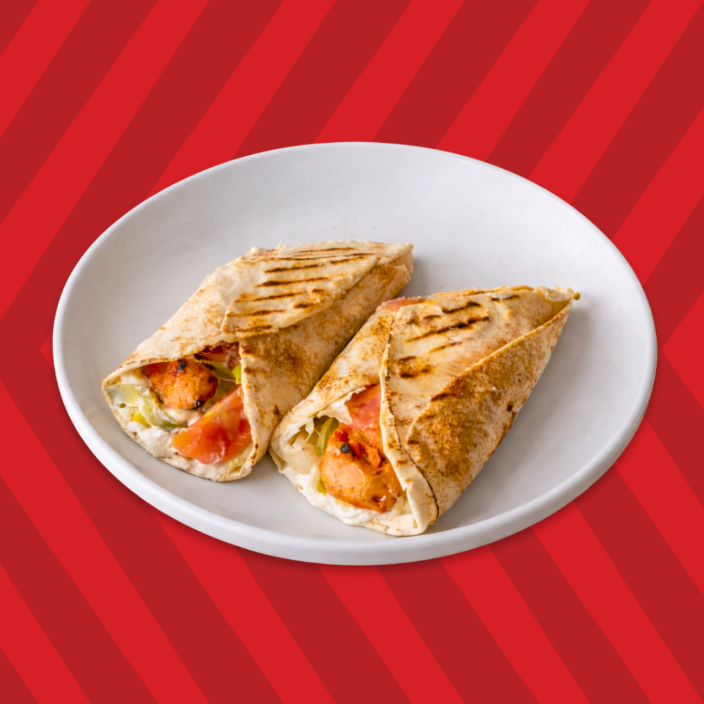 Chicken shish tawouk wrap with grilled chicken and fresh veggies